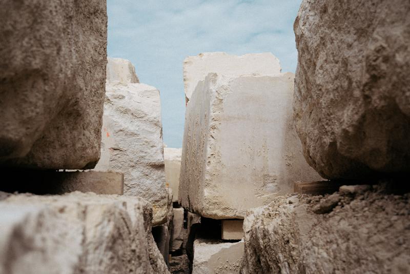 Blocks of uncut stone outside stonemason Lefevre
